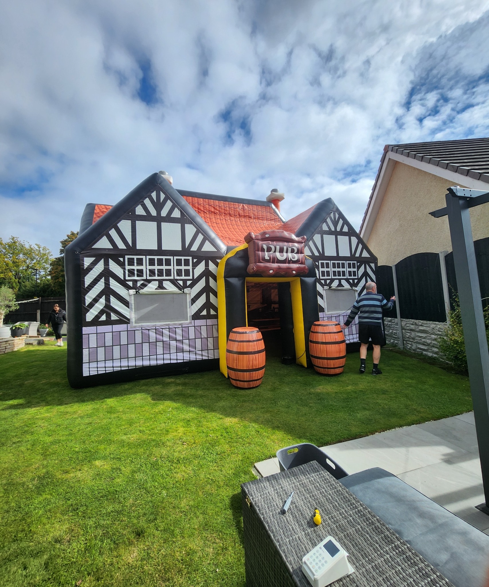 The genuine Hog's Head inflatable pub set up in a garden